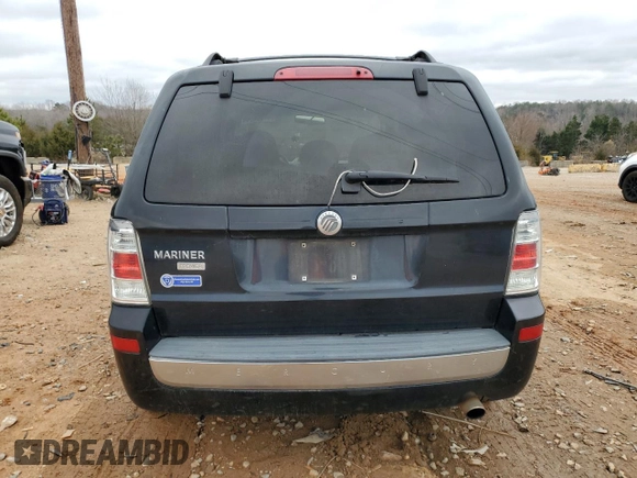 2009 Mercury Mariner Premier z VIN 4M2CU87749KJ12895, wystawiony jako Copart lot #44384555 z przebiegiem 278 370 mil mil oraz Tytuł czysty. Historia ofert i sprzedaży dostępna na DreamBid. Obrazek 6.