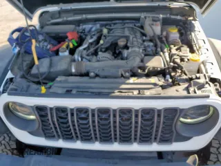 2024 Jeep Wrangler Rubicon z VIN 1C4PJXFG5RW284292, wystawiony jako Copart lot #58743975 z przebiegiem 17 971 mil mil oraz Czysty tytuł • Clean title. Historia ofert i sprzedaży dostępna na DreamBid. Obrazek 12.