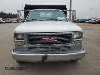 2001 GMC Sierra 1500 with VIN 3GDKC34GX1M100674, listed as a Copart auction lot 43498685 with 140,259 mi miles and Salvage Title. Bid and sale history available at DreamBid. Image 5.