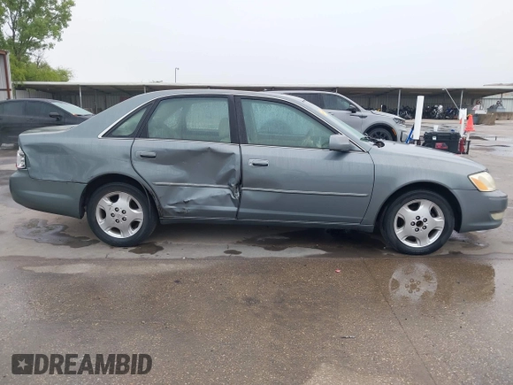 2004 Toyota Avalon XL with VIN 4T1BF28B94U387764, listed as a IAAI auction lot 42162419 with 306,611 mi miles and . Bid and sale history available at carsss.com. Image 13.