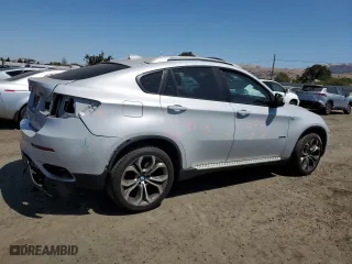 2013 BMW X6 xDrive50i with VIN 5UXFG8C57DL591913, listed as a Copart auction lot 64907674 with 113,611 mi miles and Salvage Title. Bid and sale history available at carsss.com. Image 3.