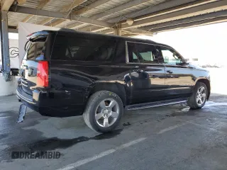 2018 Chevrolet Suburban Premier z VIN 1GNSCJKC7JR126793, wystawiony jako Copart lot #56399825 z przebiegiem 86 225 mil mil oraz Nie do naprawy • Non repairable. Historia ofert i sprzedaży dostępna na DreamBid. Obrazek 3.