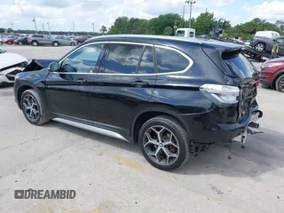 2019 BMW X1 sDrive28i with VIN WBXHU7C56K5L10962, listed as a IAAI auction lot 41904580 with 37,213 mi miles. Bid and sale history available at carsss.com. Image 3.
