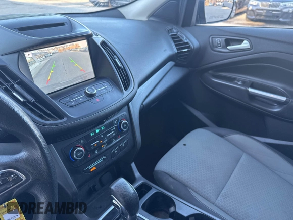 2018 Ford Escape SE with VIN 1FMCU9GD8JUA76991, listed as a IAAI auction lot 42013849 with 213,827 mi miles. Bid and sale history available at carsss.com. Image 6.