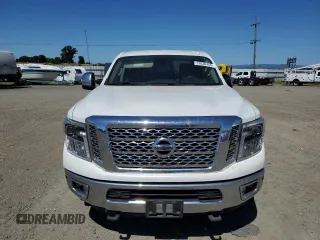 2017 Nissan Titan Pro-4X z VIN 1N6BA1F40HN559615, wystawiony jako Copart lot #57636455 z przebiegiem 99 803 mil mil oraz Szkoda całkowita • Salvage title. Historia ofert i sprzedaży dostępna na DreamBid. Obrazek 5.
