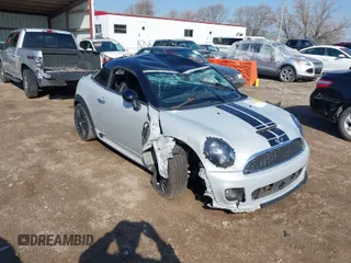 2015 MINI Coupe S z VIN WMWSX3C52FT409442, wystawiony jako IAAI lot #41900871 z przebiegiem 69 238 mil mil oraz . Historia ofert i sprzedaży dostępna na DreamBid. Obrazek 1.