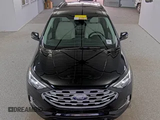 2021 Ford Edge Titanium z VIN 2FMPK4K99MBA51606, wystawiony jako IAAI lot #42360381 z przebiegiem 37 233 mil mil oraz . Historia ofert i sprzedaży dostępna na DreamBid. Obrazek 1.