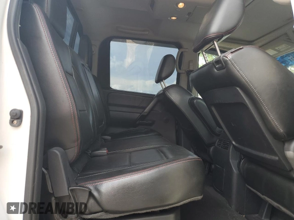 2012 Nissan Titan SV z VIN 1N6BA0EC2CN309207, wystawiony jako Copart lot #60451435 z przebiegiem 124 900 mil mil oraz Szkoda całkowita • Salvage title. Historia ofert i sprzedaży dostępna na DreamBid. Obrazek 10.