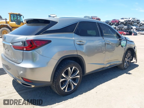 2021 Lexus RX 350 with VIN 2T2HZMAA2MC211568, listed as a IAAI auction lot 42701950 with 49,439 mi miles and . Bid and sale history available at DreamBid. Image 4.