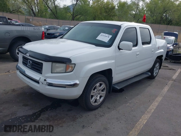 2006 Honda Ridgeline RTL z VIN 2HJYK16586H519593, wystawiony jako IAAI lot #42111678 z przebiegiem 244 962 mil mil oraz . Historia ofert i sprzedaży dostępna na DreamBid. Obrazek 2.
