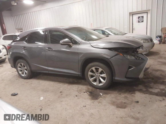 2019 Lexus RX with VIN 2T2BZMCA5KC197990, listed as a IAAI auction lot 41739917 with 74,469 mi miles. Bid and sale history available at carsss.com. Image 13.