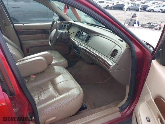 2003 Mercury Grand Marquis GS Convenience with VIN 2MEFM74W33X705854, listed as a IAAI auction lot 41619958 with 149,356 mi miles. Bid and sale history available at carsss.com. Image 5.