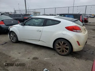 2017 Hyundai Veloster with VIN KMHTC6AD8HU310860, listed as a Copart auction lot 42170923 with 97,009 mi miles. Bid and sale history available at carsss.com. Image 2.