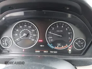 2018 BMW 3 Series 320i xDrive with VIN WBA8E5G53JNV03333, listed as a IAAI auction lot 42018275 with 45,950 mi miles. Bid and sale history available at carsss.com. Image 7.