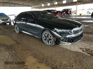2024 BMW i5 eDrive40 z VIN WBY33FK01RCP20132, wystawiony jako Copart lot #64905364 z przebiegiem 10 638 mil mil oraz Szkody całkowita. Historia ofert i sprzedaży dostępna na DreamBid. Obrazek 11.