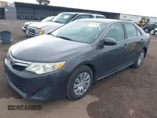2014 Toyota Camry L with VIN 4T1BF1FK5EU403313, listed as a IAAI auction lot 42141338 with 185,925 mi miles and . Bid and sale history available at DreamBid. Image 2.
