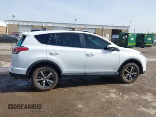 2017 Toyota RAV4 XLE with VIN 2T3WFREV3HW324973, listed as a IAAI auction lot 41778641 with 113,617 mi miles and . Bid and sale history available at DreamBid. Image 13.