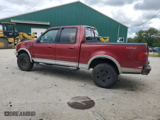 2001 Ford F-150 SuperCrew XLT with VIN 1FTRW08WX1KD75043, listed as a Copart auction lot 68133614 with 139,134 mi miles and Salvage Title. Bid and sale history available at carsss.com. Image 2.