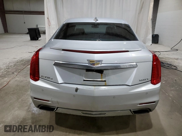 2015 Cadillac CTS AWD with VIN 1G6AW5SX2F0111350, listed as a Copart auction lot 82567214 with 116,936 mi miles and Salvage title. Bid and sale history available at DreamBid. Image 6.