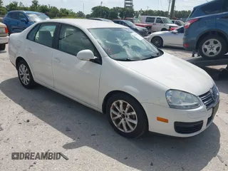 2010 Volkswagen Jetta Sedan Limited with VIN 3VWAZ7AJ7AM148894, listed as a IAAI auction lot 42173838 with 113,415 mi miles. Bid and sale history available at carsss.com. Image 1.