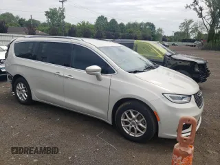 2021 Chrysler Pacifica Touring L with VIN 2C4RC1BGXMR559226, listed as a Copart auction lot 59515235 with 61,219 mi miles and Salvage title. Bid and sale history available at DreamBid. Image 4.