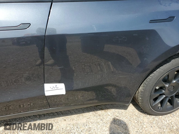 2024 Tesla Model Y Long Range z VIN 7SAYGDEE3RA234223, wystawiony jako Copart lot #51784185 z przebiegiem 24 257 mil mil oraz Szkoda całkowita • Salvage title. Historia ofert i sprzedaży dostępna na DreamBid. Obrazek 12.