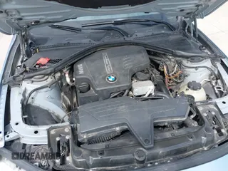 2013 BMW 3 Series 320i with VIN WBA3B1C54DK128284, listed as a IAAI auction lot 40315808 with 136,104 mi miles. Bid and sale history available at carsss.com. Image 10.