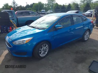 2015 Ford Focus SE with VIN 1FADP3F22FL378079, listed as a IAAI auction lot 42222144 with 92,840 mi miles and . Bid and sale history available at DreamBid. Image 2.