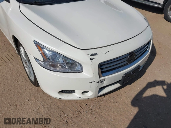 2014 Nissan Maxima SV with VIN 1N4AA5AP8EC460884, listed as a IAAI auction lot 42030564 with 189,108 mi miles and . Bid and sale history available at DreamBid. Image 6.