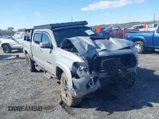 2021 Toyota Tacoma SR z VIN 3TMCZ5AN0MM397206, wystawiony jako IAAI lot #41965688 z przebiegiem 55 967 mil mil oraz . Historia ofert i sprzedaży dostępna na DreamBid. Obrazek 1.