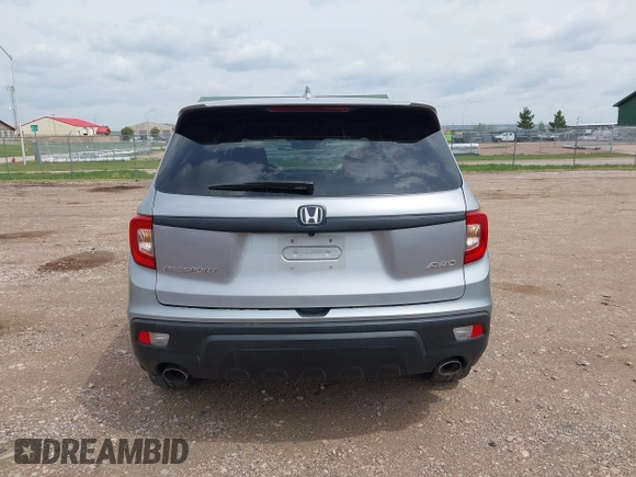 2020 Honda Passport EX-L with VIN 5FNYF8H59LB014260, listed as a IAAI auction lot 42274421 with 111,830 mi miles and . Bid and sale history available at DreamBid. Image 17.