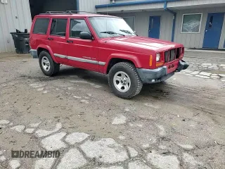 2001 Jeep Cherokee Sport with VIN 1J4FT48S41L570480, listed as a Copart auction lot 56123925 with 216,338 mi miles and Salvage title. Bid and sale history available at DreamBid. Image 14.