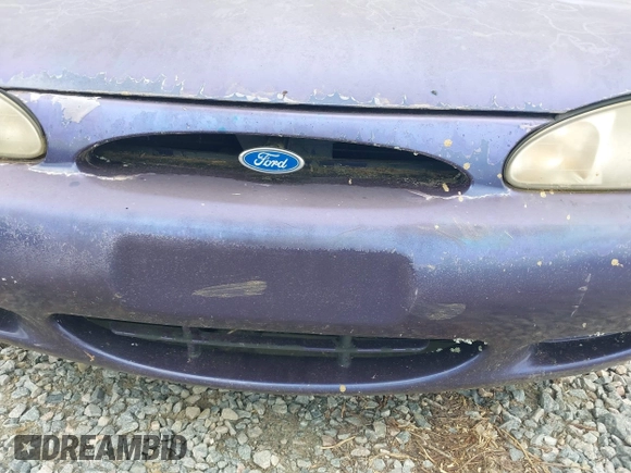 1997 Ford Escort LX z VIN 3FALP15P1VR145288, wystawiony jako IAAI lot #42463476 z przebiegiem 197 659 mil mil oraz . Historia ofert i sprzedaży dostępna na DreamBid. Obrazek 12.