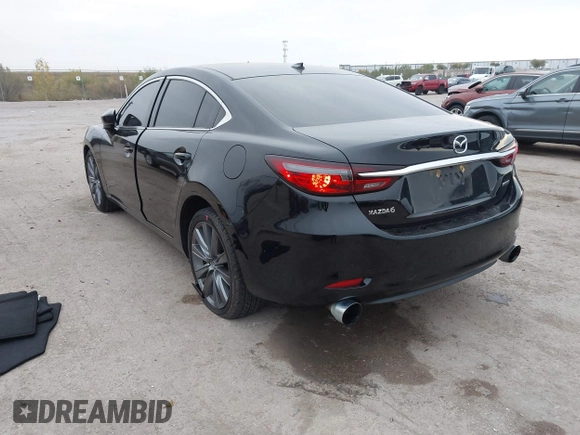 2020 Mazda 6 Grand Touring with VIN JM1GL1TY5L1513949, listed as a IAAI auction lot 40953540 with 55,616 mi miles and . Bid and sale history available at DreamBid. Image 3.