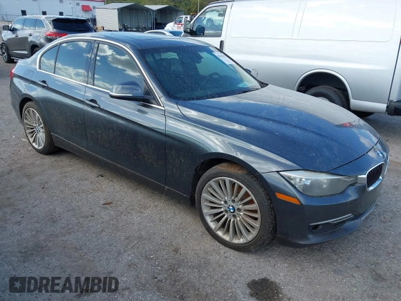 2013 BMW 3 Series 328i xDrive with VIN WBA3B3G56DNR81144, listed as a IAAI auction lot 40620694 with 159,022 mi miles. Bid and sale history available at carsss.com. Image 1.