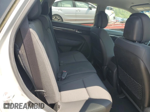 2012 Kia Sorento LX z VIN 5XYKT3A60CG200444, wystawiony jako Copart lot #60508715 z przebiegiem 47 935 mil mil oraz Czysty tytuł • Clean title. Historia ofert i sprzedaży dostępna na DreamBid. Obrazek 11.