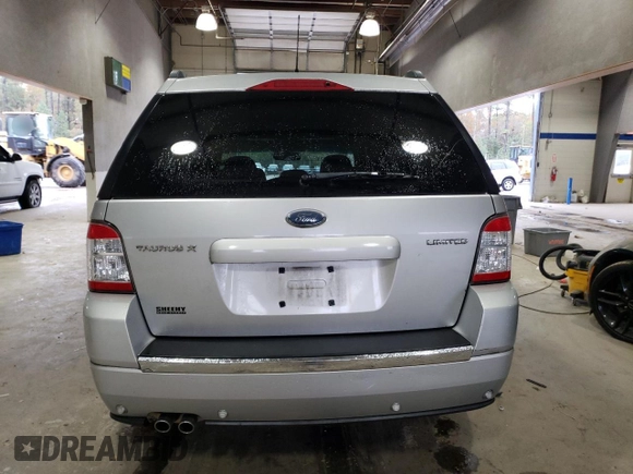 2009 Ford Taurus X Limited with VIN 1FMDK03W59GA01446, listed as a Copart auction lot 80666874 with 135,957 mi miles and Salvage title. Bid and sale history available at DreamBid. Image 6.
