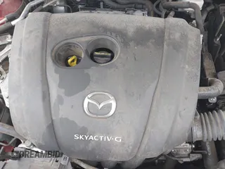 2019 Mazda 3 Preferred z VIN JM1BPAMM2K1135386, wystawiony jako IAAI lot #40367062 z przebiegiem 9 999 mil mil oraz . Historia ofert i sprzedaży dostępna na DreamBid. Obrazek 10.