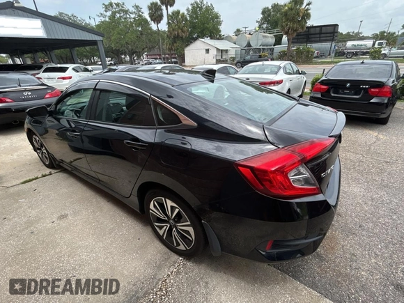 2017 Honda Civic EX-L с VIN 19XFC1F76HE013074, выставлен на аукционе Copart как лот 60144655 с пробегом 121 493 миль миль и Чистый • Clean title. История ставок и продаж доступна на DreamBid. Изображение 3.