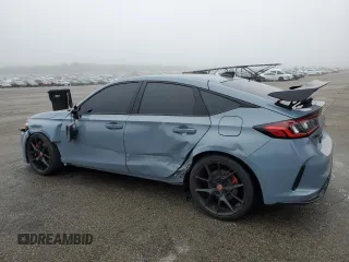 2023 Honda Civic Type R z VIN JHMFL5G40PX003732, wystawiony jako Copart lot #51764935 z przebiegiem 7040 mil mil oraz Szkody całkowita. Historia ofert i sprzedaży dostępna na DreamBid. Obrazek 2.