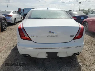 2014 Jaguar XJ Portfolio with VIN SAJWJ2GD6E8V74284, listed as a Copart auction lot 74577584 with 39,835 mi miles and Non repairable. Bid and sale history available at DreamBid. Image 6.