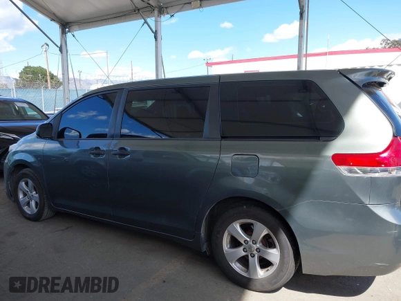 2014 Toyota Sienna L with VIN 5TDZK3DC6ES441417, listed as a IAAI auction lot 41950033 with 170,804 mi miles. Bid and sale history available at carsss.com. Image 14.