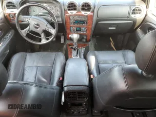 2006 GMC Envoy SLT with VIN 1GKDT13S862238613, listed as a Copart auction lot 70585704 with 147,337 mi miles and Salvage Title. Bid and sale history available at carsss.com. Image 8.