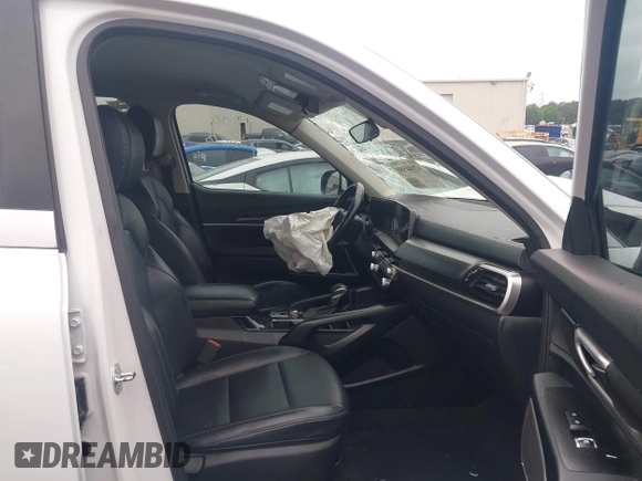 2024 Kia Telluride LX z VIN 5XYP24GC1RG411138, wystawiony jako IAAI lot #42144580 z przebiegiem Nie podano mil oraz . Historia ofert i sprzedaży dostępna na DreamBid. Obrazek 5.