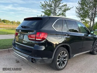 2017 BMW X5 xDrive35i with VIN 5UXKR0C57H0U49966, listed as a Copart auction lot 54274305 with 117,301 mi miles and Clean Title. Bid and sale history available at carsss.com. Image 4.