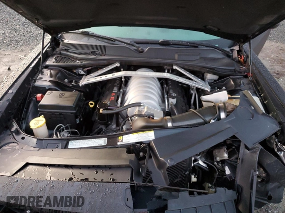 2010 Dodge Challenger SRT-8 with VIN 2B3CJ7DW8AH104011, listed as a Copart auction lot 87216334 with 55,519 mi miles and Salvage title. Bid and sale history available at DreamBid. Image 12.