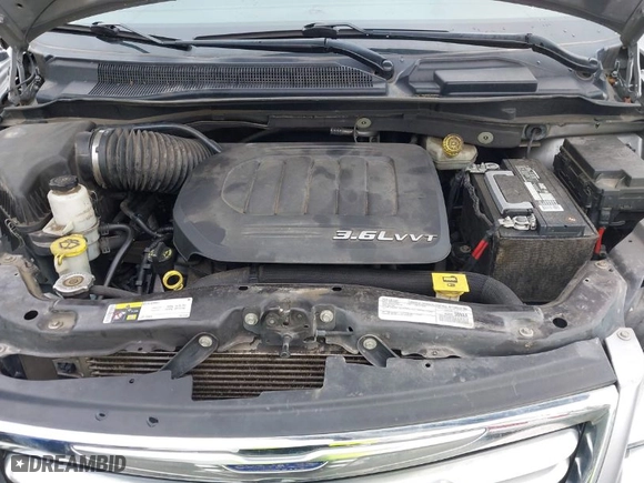2016 Chrysler Town & Country Touring with VIN 2C4RC1BG4GR292735, listed as a IAAI auction lot 41931677 with 140,708 mi miles. Bid and sale history available at carsss.com. Image 10.