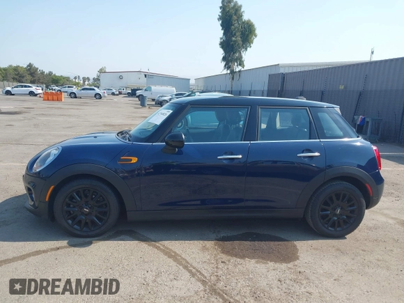 2015 MINI Hardtop 4 Door with VIN WMWXS5C50FT830060, listed as a IAAI auction lot 42744826 with 99,813 mi miles and . Bid and sale history available at DreamBid. Image 14.