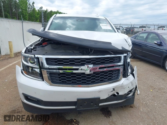 2020 Chevrolet Tahoe LT with VIN 1GNSCBKC4LR181887, listed as a IAAI auction lot 42160821 with 106,757 mi miles and . Bid and sale history available at DreamBid. Image 12.