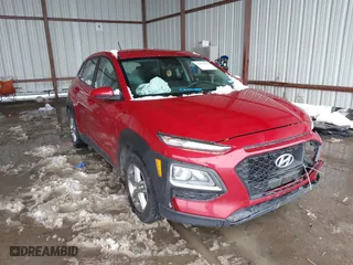 2021 Hyundai Kona SE with VIN KM8K12AA2MU645171, listed as a IAAI auction lot 41290358 with 77,015 mi miles. Bid and sale history available at carsss.com. Image 1.